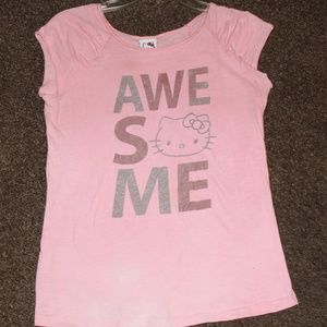 This is a kids soft pink hello kitty shirt!